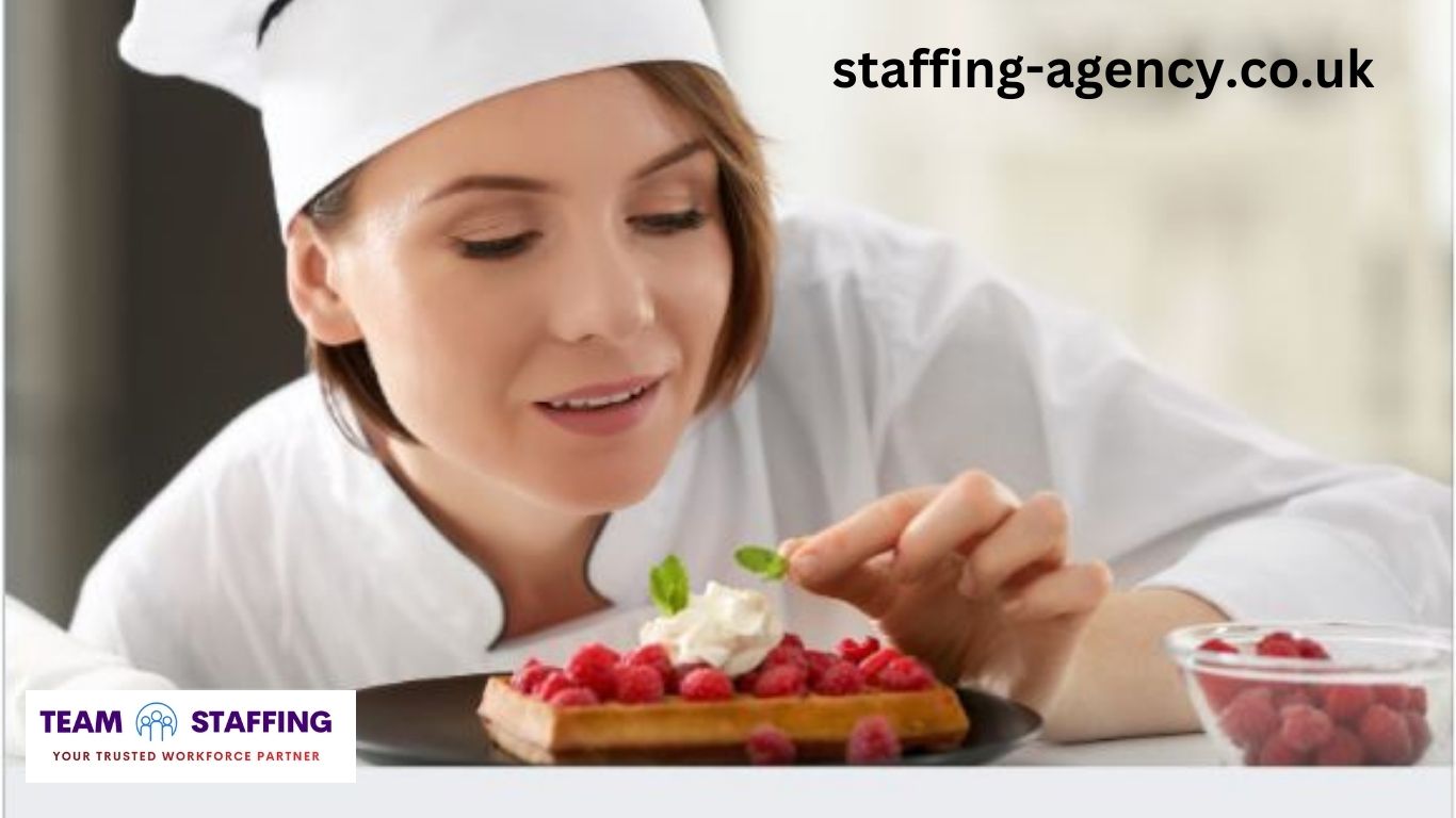 Professional chef preparing a dish in a restaurant kitchen